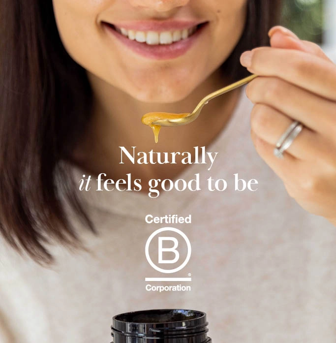 Eating honey with strapline 'Naturally it feels good to be B-Corp Certifiedf'